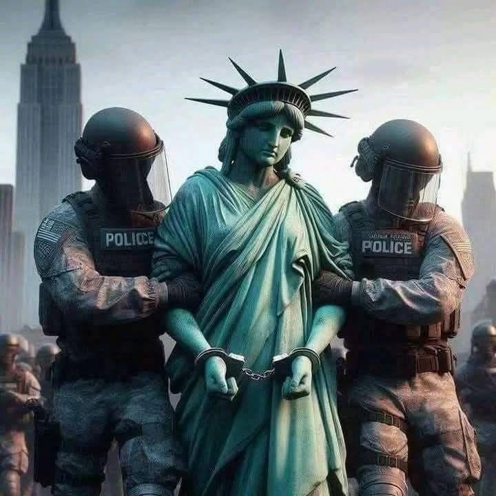 An AI looking image of two police offers escorting Lady Liberty away in handcuffs.